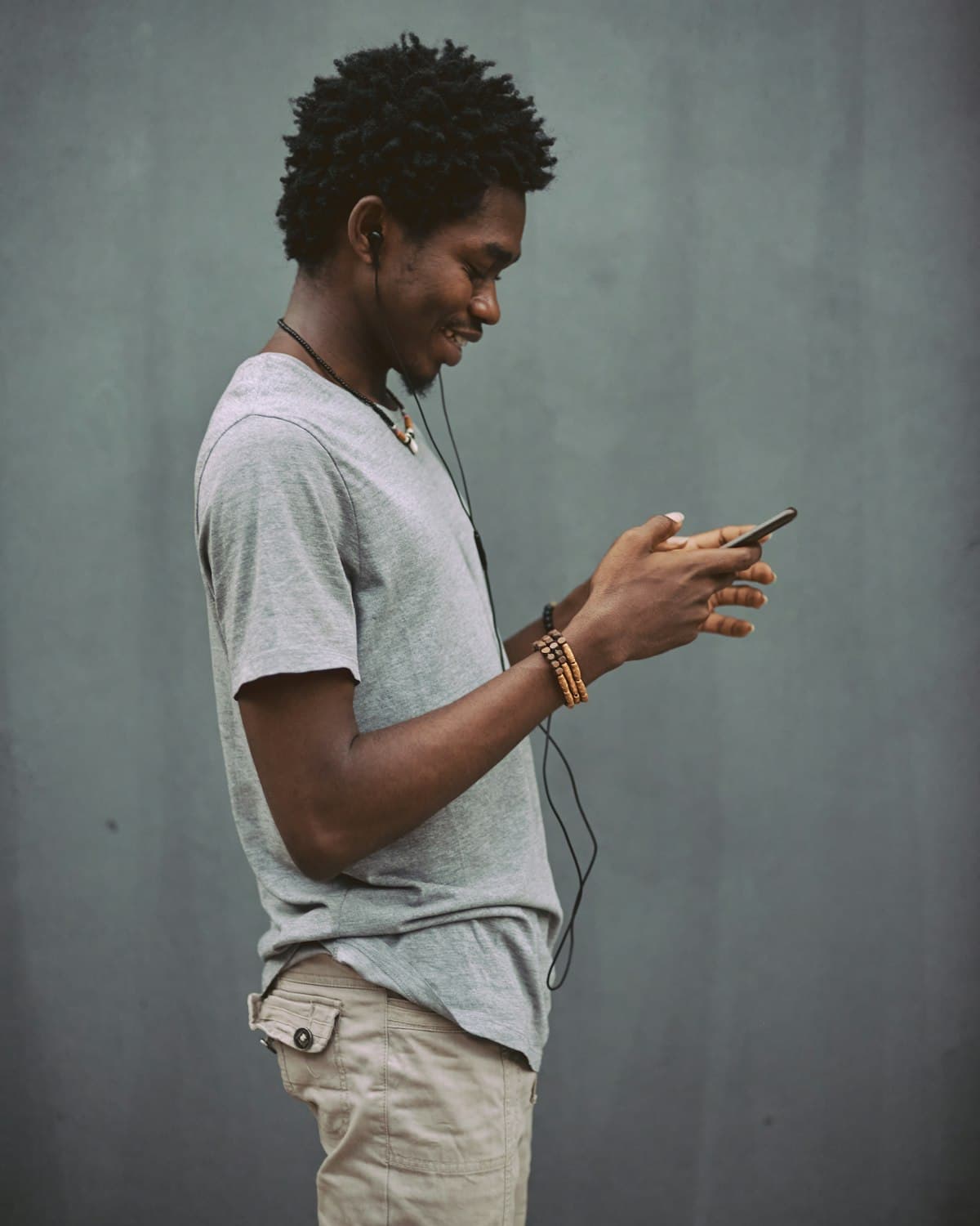 Someone smiling while learning to read charts on their phone